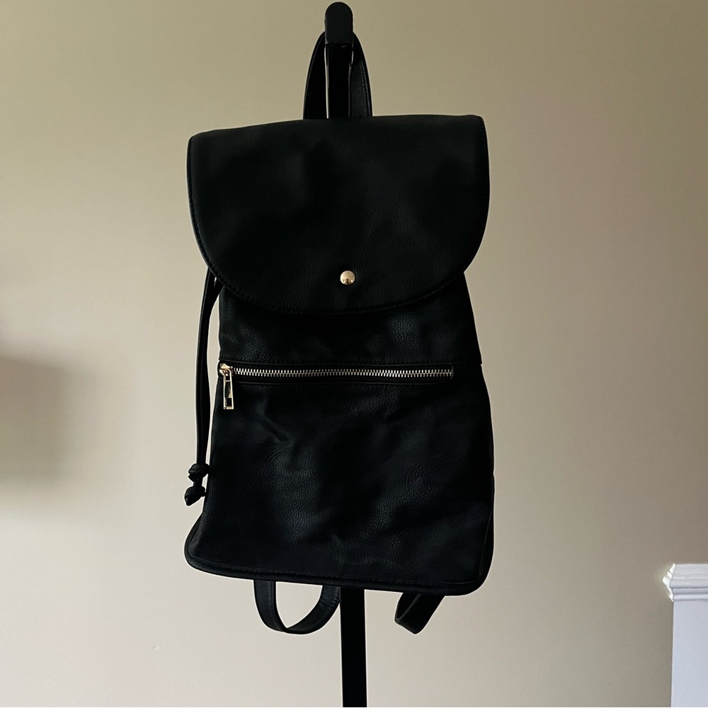 Black Backpack with Gold Accents